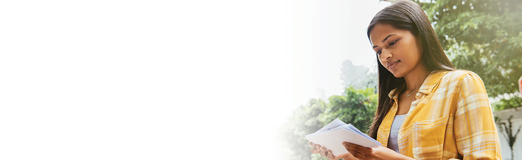 woman looking at mail