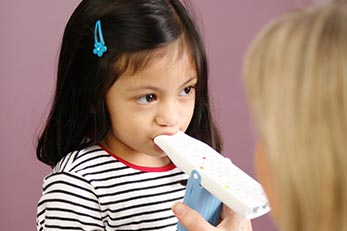 Doctor running a test on a girl 