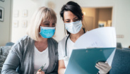 Patient and doctor reviewing test results together. Patient and doctor reviewing test results together.