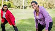 Two women stretching Two women stretching