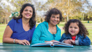 Family Reading a Book