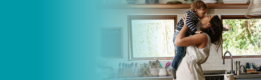 Woman and boy together in kitchen